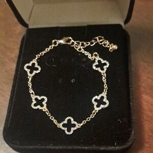 Elegant Gold and Silver Clover Bracelet
